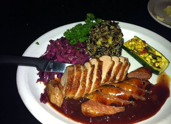 Brave New Restaurant signature dishes Walleye with Pecan-Herb Crust, Mixed Grill, Duck Breast with Berry Glaze, Chocolate Crème Brûlée